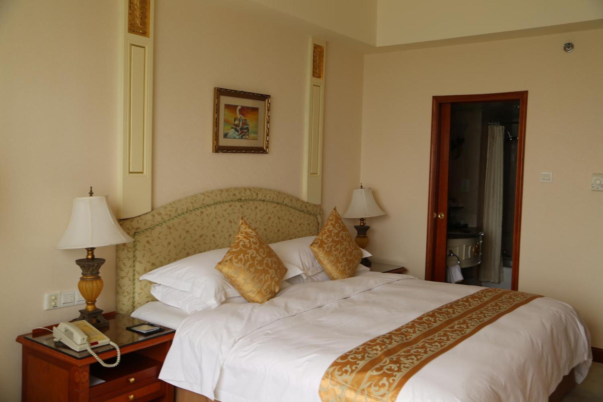 Huiquan Dynasty Hotel Csingtao Szoba fotó